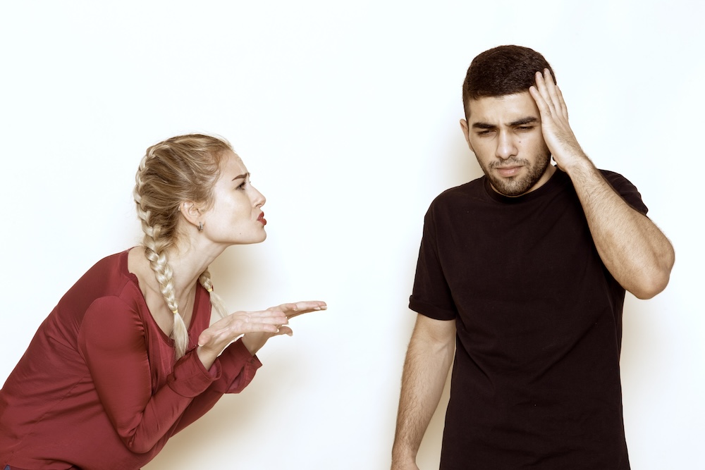 front view young female in red shirt quarelling with male on the cream desk female cloth photo violence